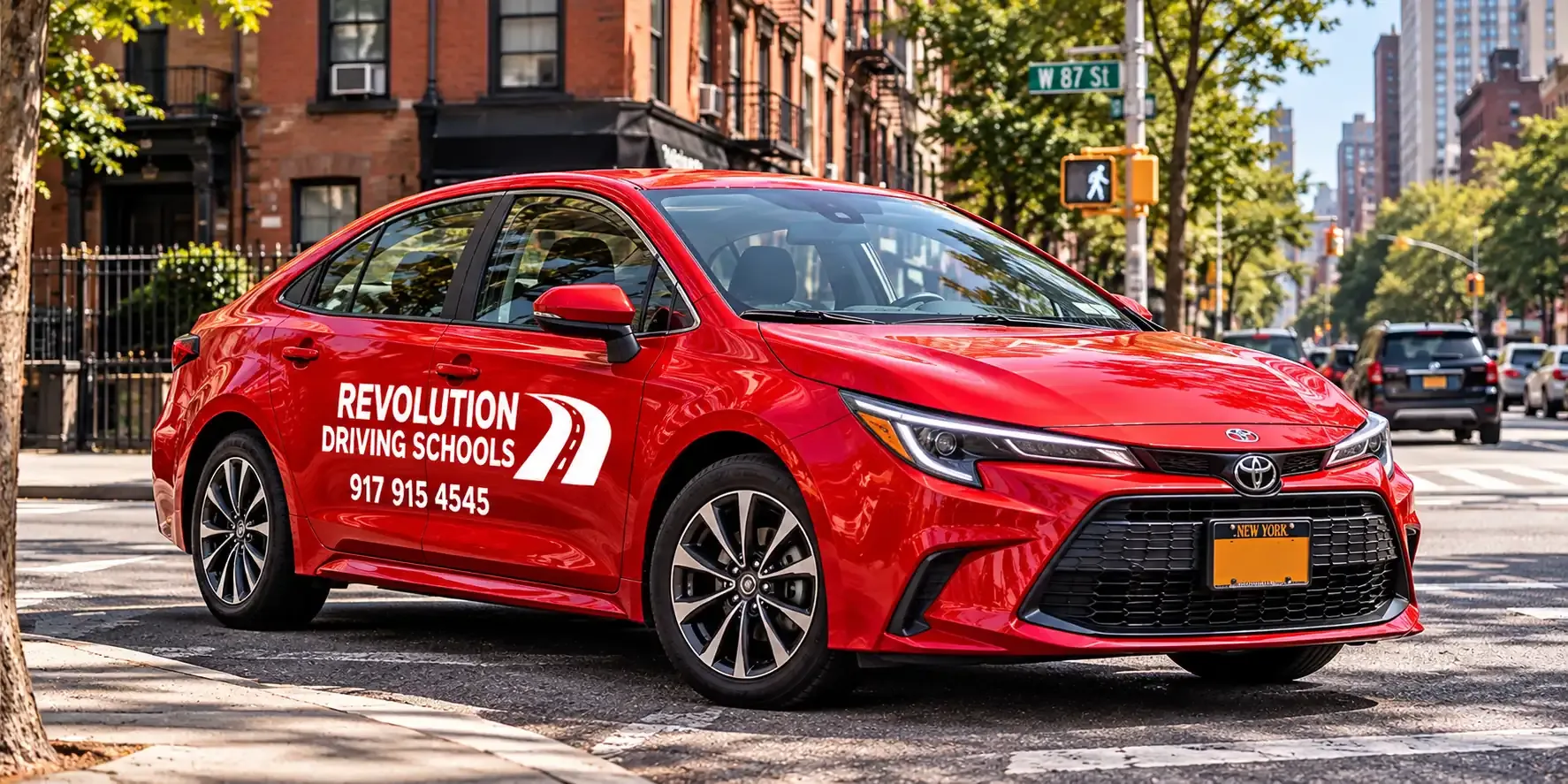 Revolution Driving Schools red car on a New York City street
